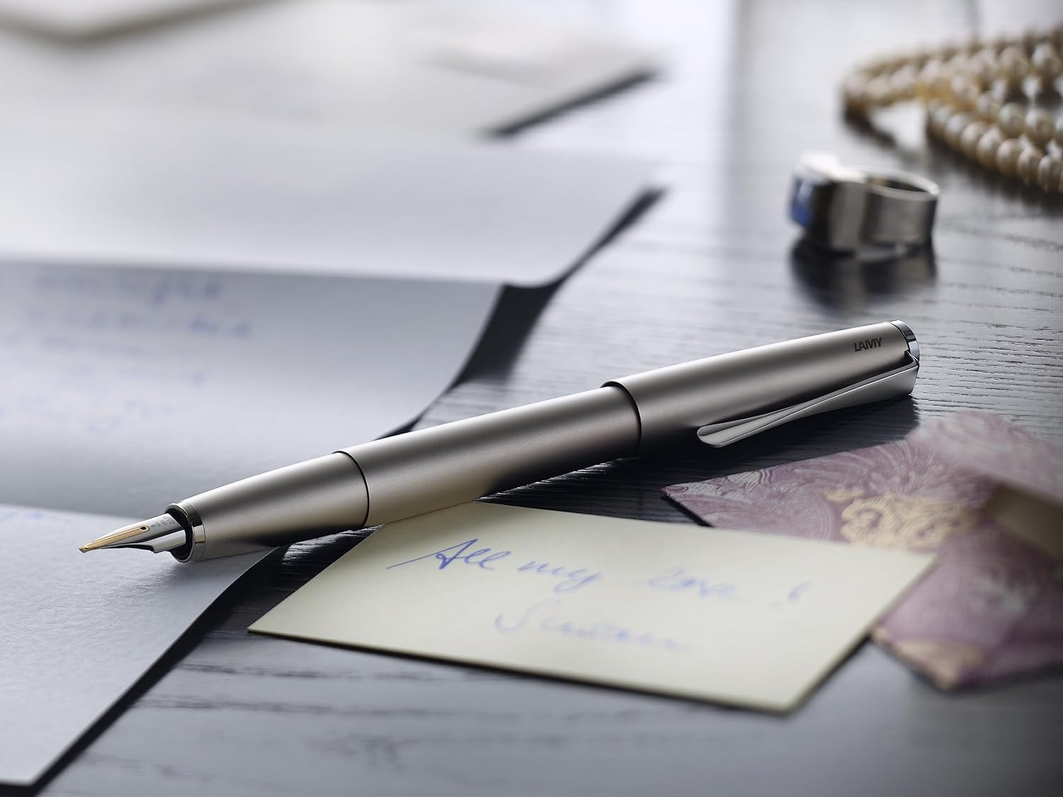 image:imageLamy studio black Fountain Pen in elegant metal body steel nib partially platinumplated amp in nib size M incl T 10 blue ink cartridgePalladium